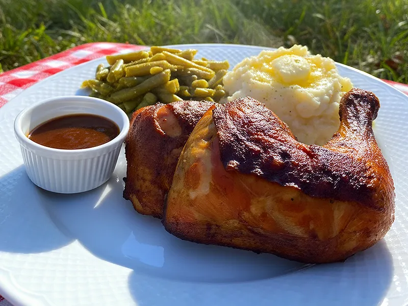 Smoked chicken leg quarter with green beans and mashed potatoes